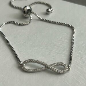 NWOT-18K White Gold Filled Infinity Bracelet | Adjustable | AAA CZ Stones |